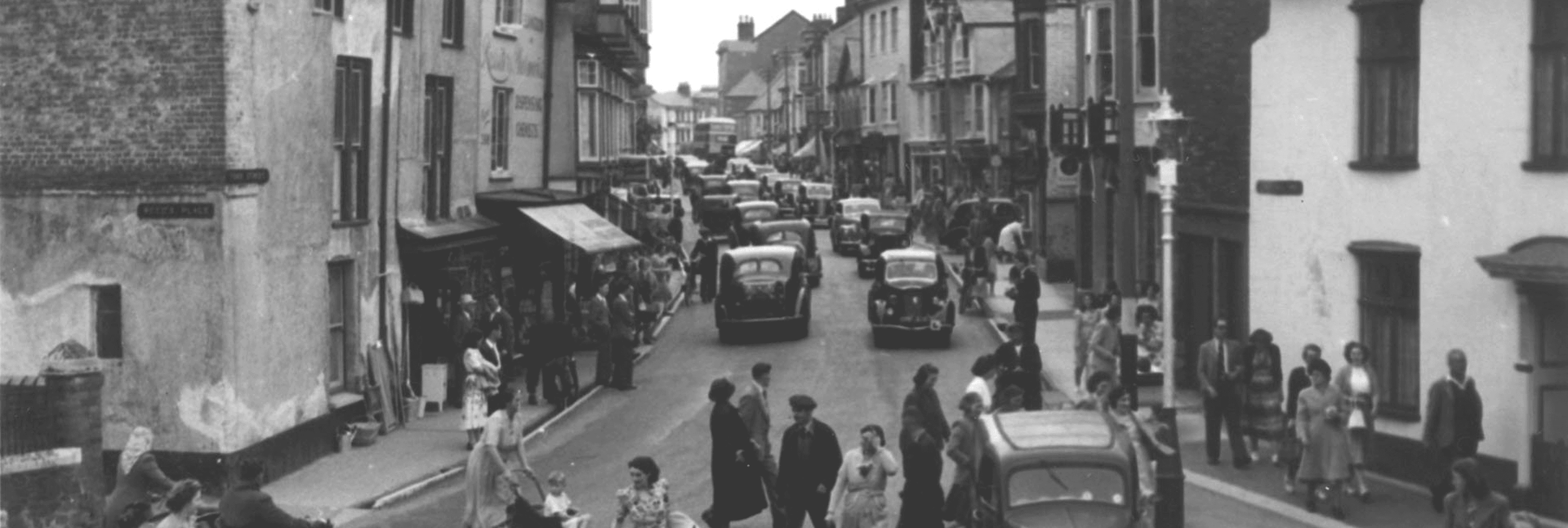 a picture of the cullomton high street in the old days